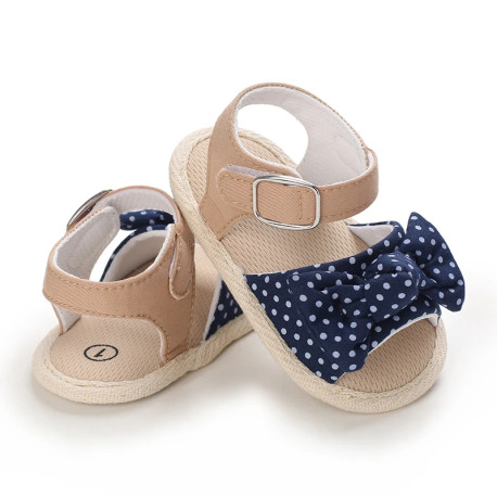صندل دخترانه نوزاد و کودک استپ دار طرح پاپیون سرمه ای خال سفید Baby girl footwear