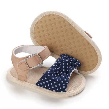 صندل دخترانه نوزاد و کودک استپ دار طرح پاپیون سرمه ای خال سفید Baby girl footwear