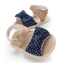 صندل دخترانه نوزاد و کودک استپ دار طرح پاپیون سرمه ای خال سفید Baby girl footwear