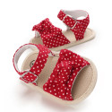 صندل دخترانه وارداتی نوزاد و کودک استپ دار طرح پاپیون قرمز خالدار Baby girl footwear